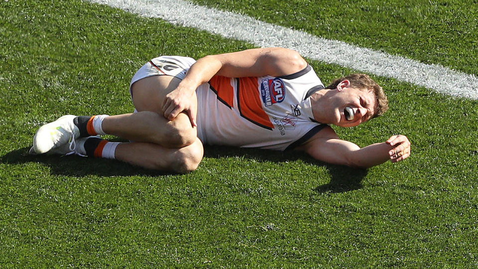 Jacob Hopper, pictured here in agony after picking up an injury.