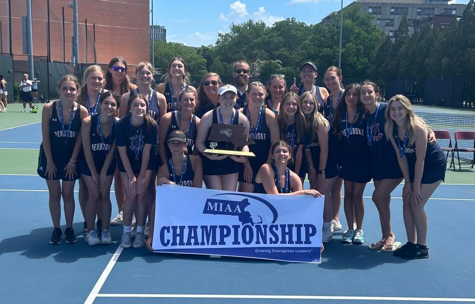 Members of the Pembroke High girls tennis team pose with the MIAA Division 3 state championship trophy after beating Weston, 3-2, at MIT's courts on Saturday, June 15, 2024.