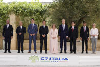 From left, European Council President Charles Michel, German Chancellor Olaf Scholz, Canada's Prime Minister Justin Trudeau, French President Emmanuel Macron, Italian Prime Minister Giorgia Meloni, U.S. President Joe Biden, Japan's Prime Minister Fumio Kishida, Britain's Prime Minister Rishi Sunak and European Commission President Ursula von der Leyen stand for a group photo at the G7, Thursday, June 13, 2024, in Borgo Egnazia, Italy. (AP Photo/Alex Brandon)