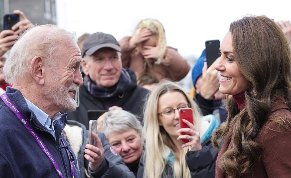 Catherine, Princess of Wales (R) reacts as she is reunited with an old school teacher of hers following the tour of the National Maritime Museum Cornwall on February 9, 2023 in Falmouth, England.