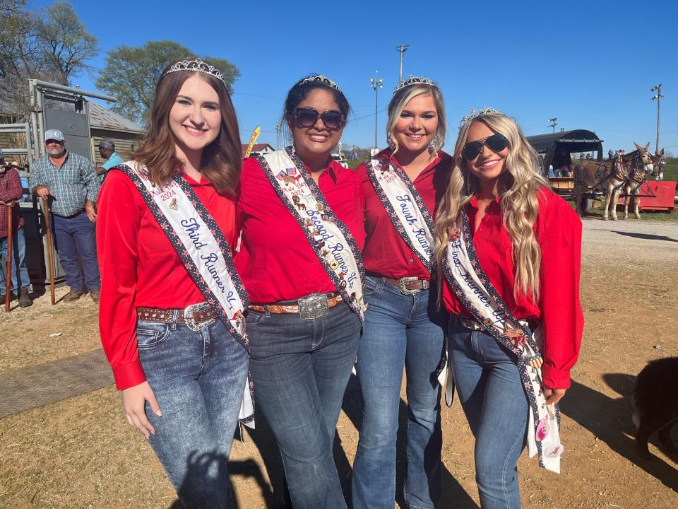 Mule Day Queens enjoyed a day at Maury County Park for mule shows and family fun on Mule Day in Columbia, Tenn. on April 6, 2024. (Left) Shae Klamert, 3rd Runner up, Graciee English, 2nd Runner-up, Ava Sykes, 1st Runner-up, and Runner-up Kennedy Bragg stand at the main arena.