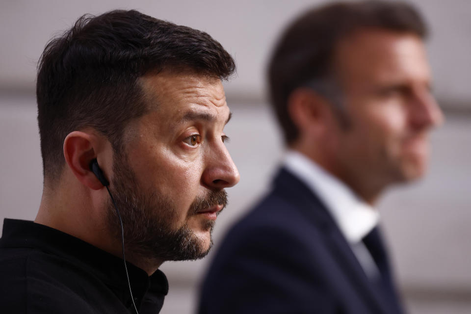 Ukrainian President Volodymyr Zelenskyy speaks during a joint press conference with French President Emmanuel Macron Friday, June 7, 2024 at the Elysee Palace in Paris. U.S. President Joe Biden was due to meet with Ukrainian President Volodymyr Zelenskyy in Paris on Friday as Kyiv's army endures its hardest days of fighting since the early weeks of the war with Russia and prepares for what officials say could be a tough summer ahead. (Yoan Valat, Pool via AP)