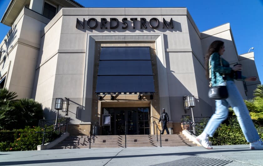 LOS ANGELES, CA - NOVEMBER 23, 2021: A security guard patrols the front entrance of Nordstrom on Tuesday after an organized group of thieves attempted a smash-and-grab robbery late Monday night at The Grove location November 23, 20201 in Los Angeles, California. (Gina Ferazzi / Los Angeles Times)