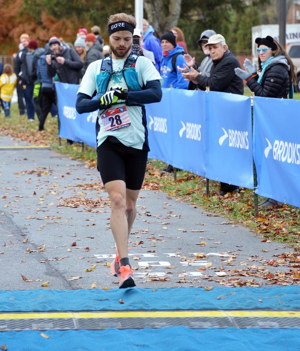Nick Arndt finishes sixth overall in the 59th annual JFK 50 Mile ultramarathon, clocking 5:56:14 as the last of the runners to get under the six-hour mark. In all, 47 runners have achieved that feat in JFK history.