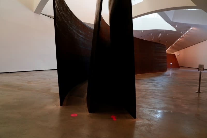 A Richard Serra sculpture with social distancing indications is seen at the Guggenheim Museum on the day it reopens its doors following a three-month closure, amid the coronavirus disease (COVID-19) outbreak, in Bilbao