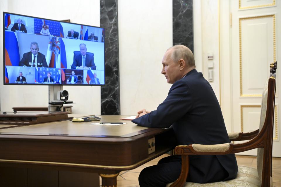 Russian President Vladimir Putin chairs a Security Council meeting via videoconference at the Kremlin in Moscow, Russia, Friday, July 14, 2023. (Alexander Kazakov, Sputnik, Kremlin Pool Photo via AP)