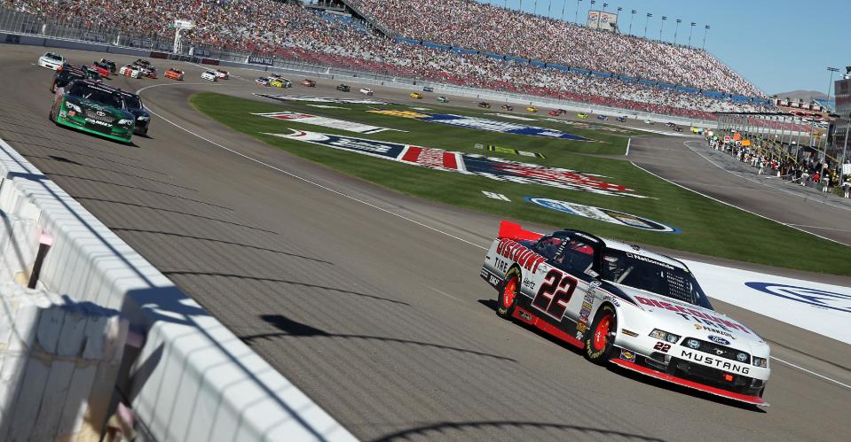 Brad Keselowski (22) leads during a caution period in the NASCAR Nationwide Series auto race Saturday, March 8, 2014, in Las Vegas. Keselowski won the race. (AP Photo/Isaac Brekken)
