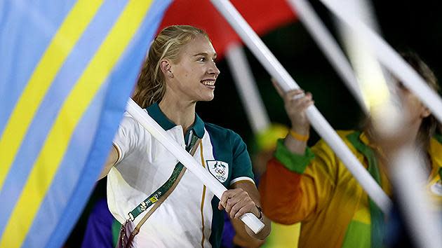 Flag bearer Kim Brennan of Australia walks during the 'Heroes of the Games' segment during the Closing Ceremony. Pic: Getty