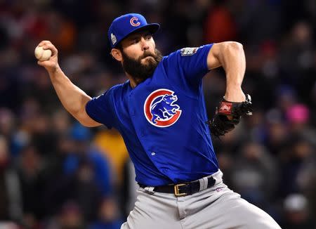 Oct 26, 2016; Cleveland, OH, USA; Chicago Cubs starting pitcher Jake Arrieta throws a pitch against the Cleveland Indians in the fifth inning in game two of the 2016 World Series at Progressive Field. Ken Blaze-USA TODAY Sports