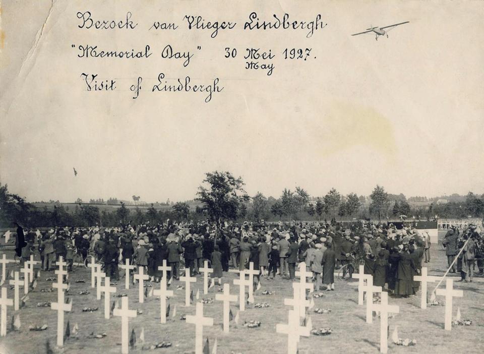 In this May 30, 1927 photo, provided by the Gavergids Belgium, American aviator Charles Lindbergh flies over the Flanders Field American Cemetery in Waregem, Belgium during a Memorial Day service. The cemetery contains the remains of 368 U.S. WWI military and support personnel. Of those remains, 21 are unknown and could not be identified. On Wednesday, March 26, 2014 President Barack Obama will honor those Americans who died in a struggle so all-encompassing, so horrific, it simply became known as the Great War. (AP Photo)