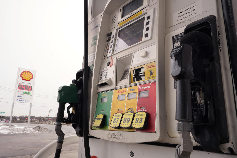 Gasoline and Diesel prices are displayed on a pump at a Shell gas station, Thursday, Feb. 18, 2021, in Westwood, Mass. A deep freeze in the Gulf state region and beyond that killed dozens of people, left millions without power and jeopardized drinking water systems also forced as many as 11 refineries offline. The resulting capacity cuts could drive gas prices up by about 10 to 20 cents per gallon, said Patrick DeHaan, petroleum analyst at the travel app GasBuddy. (AP Photo/Steven Senne)