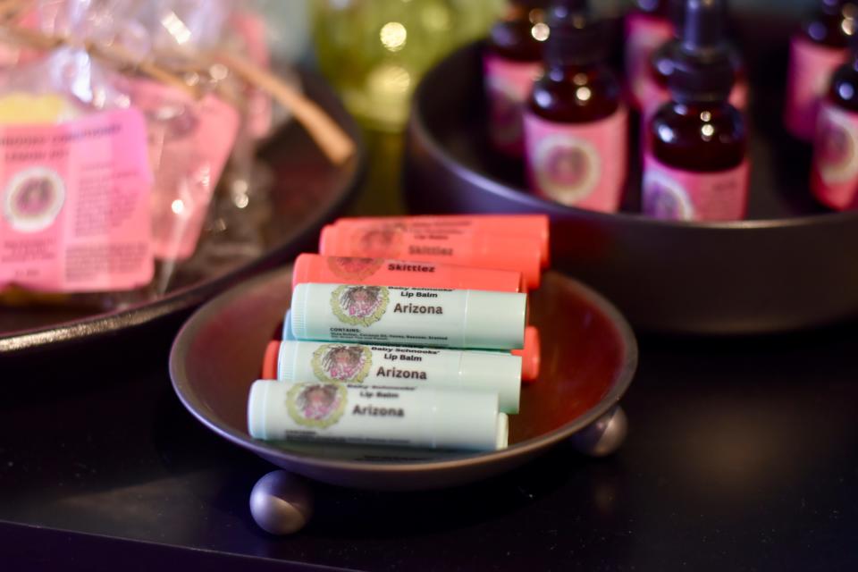 Baby Schnooks, a woman-owned business in Newburgh, donates proceeds from a line of chapsticks – with flavors inspired by Arizona Iced Teas and Skittles – to the Trayvon Martin Foundation.