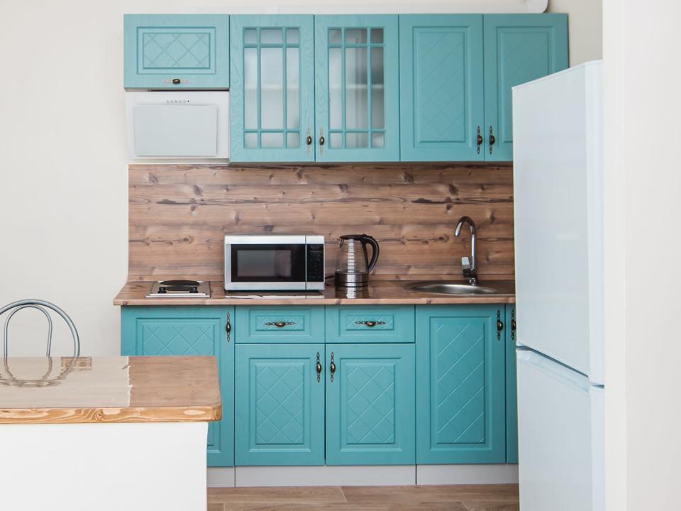 White and teal kitchen