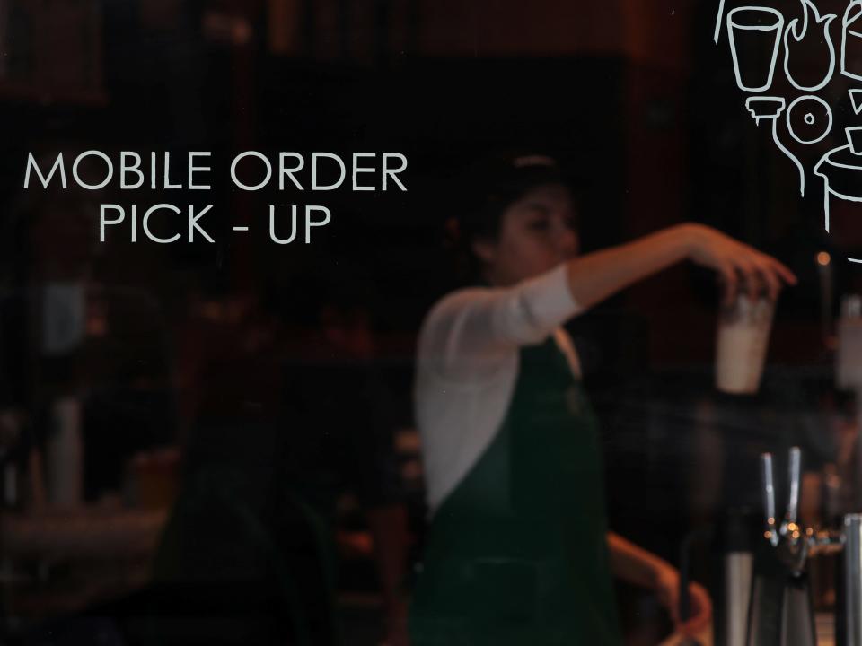 Starbucks barista makes mobile orders