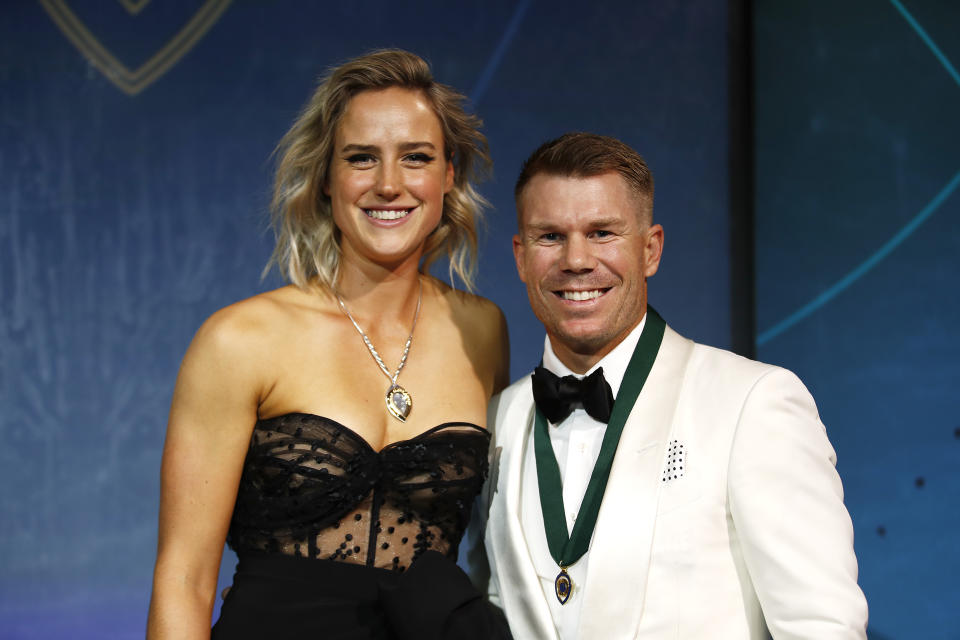 Ellyse Perry (L) winner of the Belinda Clark Award poses with David Warner, winner of the Allan Border Medal during the 2020 Cricket Australia Awards at Crown Palladium on February 10, 2020 in Melbourne, Australia. (Photo by Daniel Pockett/Getty Images)