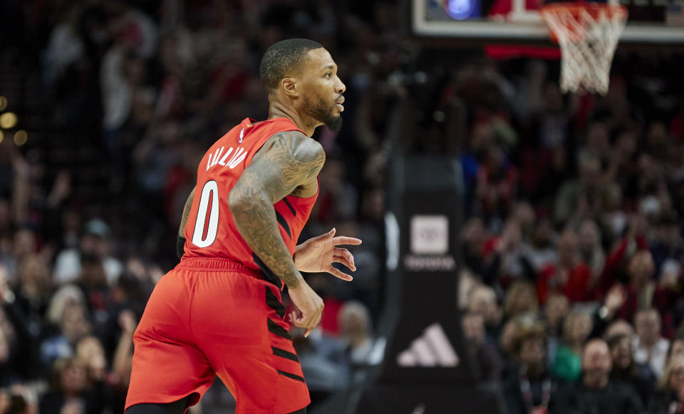 Portland Trail Blazers guard Damian Lillard runs up court during the first half of an NBA basketball game against the Phoenix Suns in Portland, Ore., Friday, Oct. 21, 2022. (AP Photo/Craig Mitchelldyer)