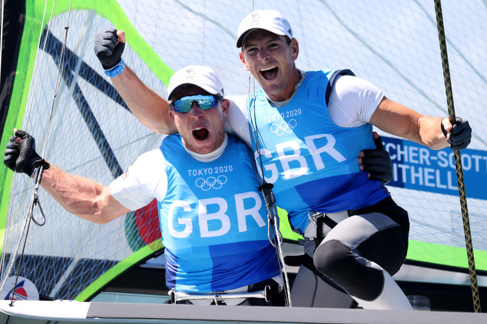 FUJISAWA, JAPAN - AUGUST 03: Dylan Fletcher (R) and Stuart Bithell of Team Great Britain celebrate as they win gold in the Men's Skiff 49er class on day eleven of the Tokyo 2020 Olympic Games at Enoshima Yacht Harbour on August 03, 2021 in Fujisawa, Japan. (Photo by Phil Walter/Getty Images)