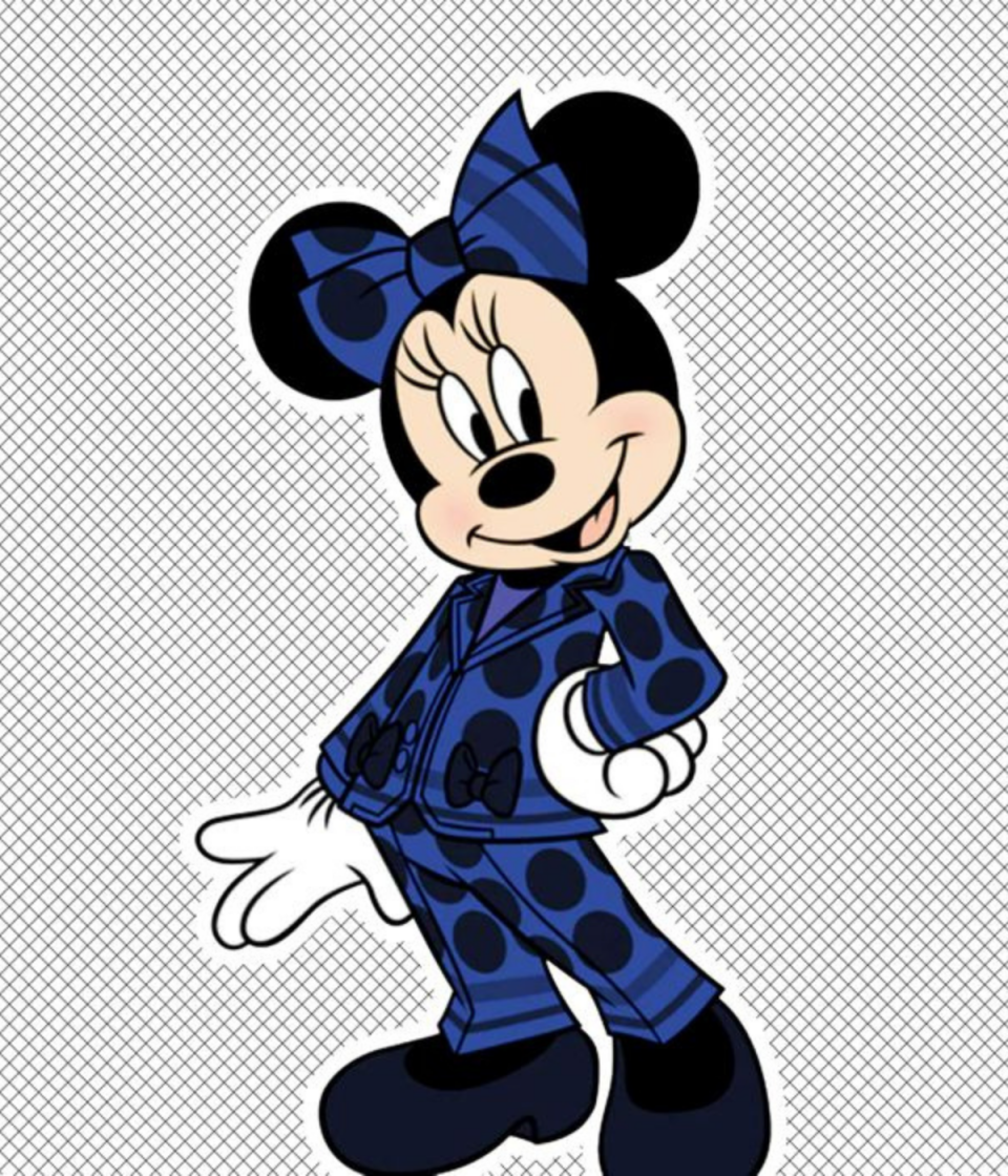 Minnie Mouse rocks a funky blue pantsuit with black spots and matching bow.