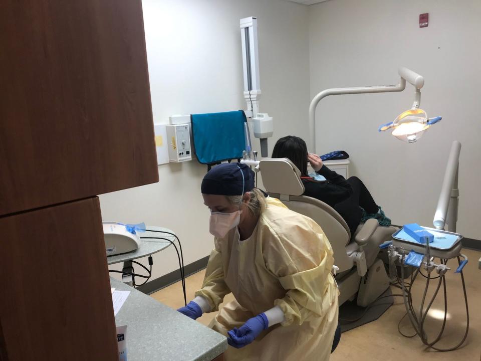 Hygienist Tanya Russin with a patient in the dental clinic at Richford Health Center, as seen on April 21, 2021.