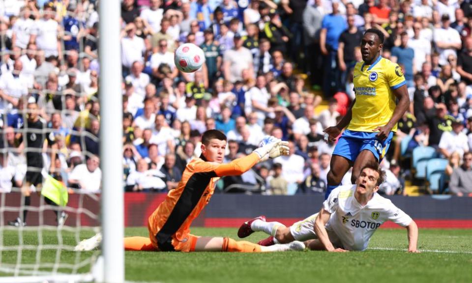 Illan Meslier and Diego Llorente of Leeds United look on as Danny Welbeck scores Brighton’s first goal during the Premier League match at Elland Road on 15 May, 2022.