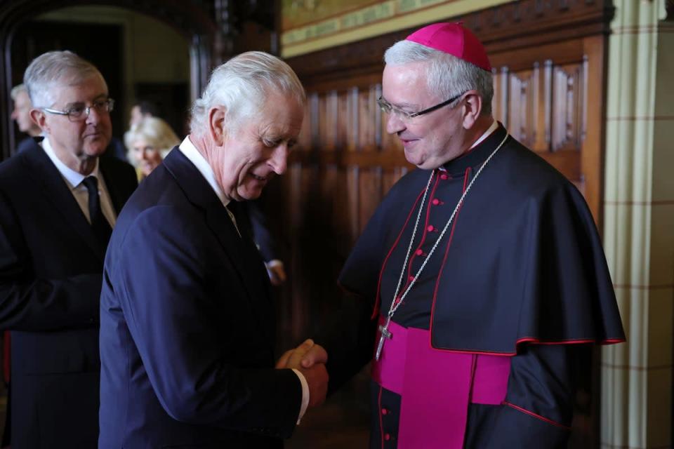 King Charles III meets Archbishop of Cardiff Mark O’Toole (right) (Chris Jackson/PA) (PA Wire)