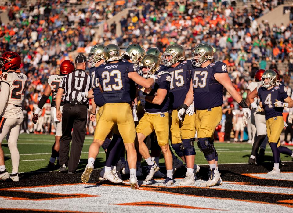 Dec 29, 2023; El Paso, TX, USA; Notre Dame running back Chase Ketterer (27) celebrates after scoring a touchdown against the Oregon State Beavers in the second half at Sun Bowl Stadium. Mandatory Credit: Ivan Pierre Aguirre-USA TODAY Sports