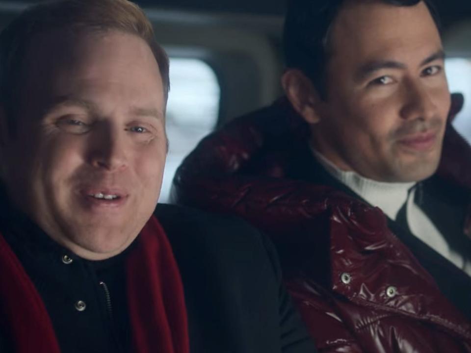 terry and tad sitting in a limo in falling for christmas