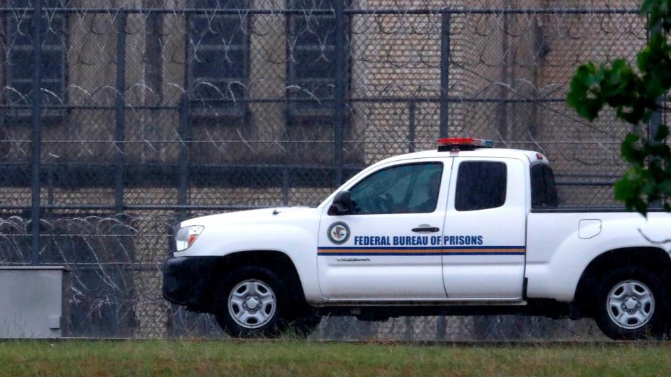 PHOTO: A Federal Bureau of Federal Prisons truck drives past barbed wire fences at the Federal Medical Center prison in Fort Worth, Texas, May 16, 2020.  (LM Otero/AP, FILE)