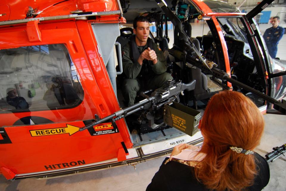 US Coast Guard helicopter marksman machine gun