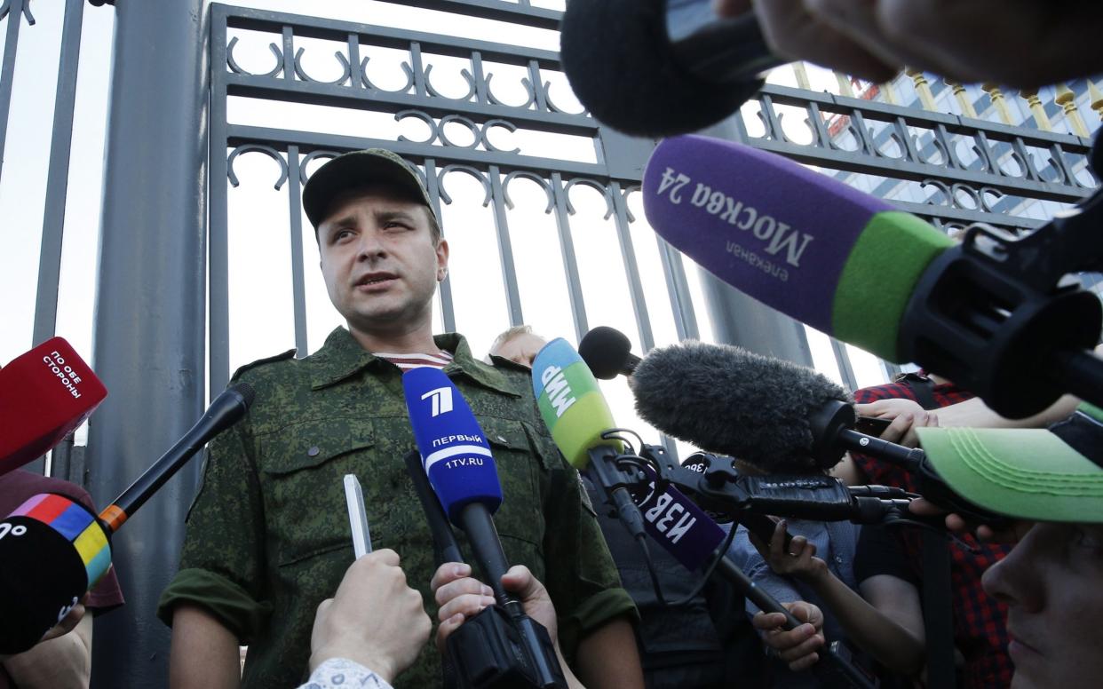Lieutenant Colonel Alexander Kudryavtsev, senior officer of the Media Relations Department at the National Guard of Russia addresses the media - TASS