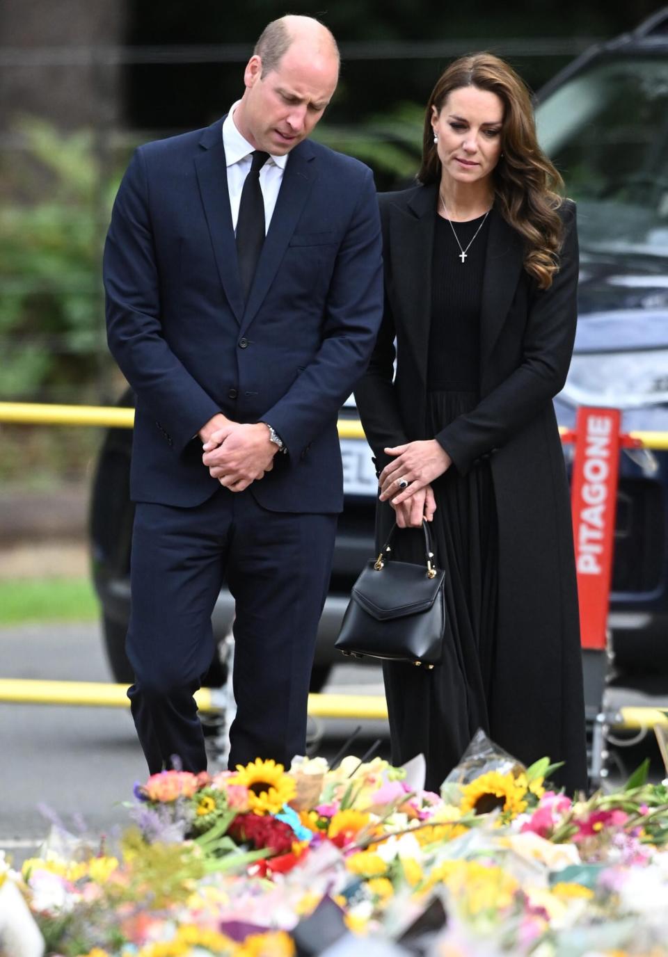 Prince William, Prince of Wales and Catherine, Princess of Wales view floral tributes at Sandringham