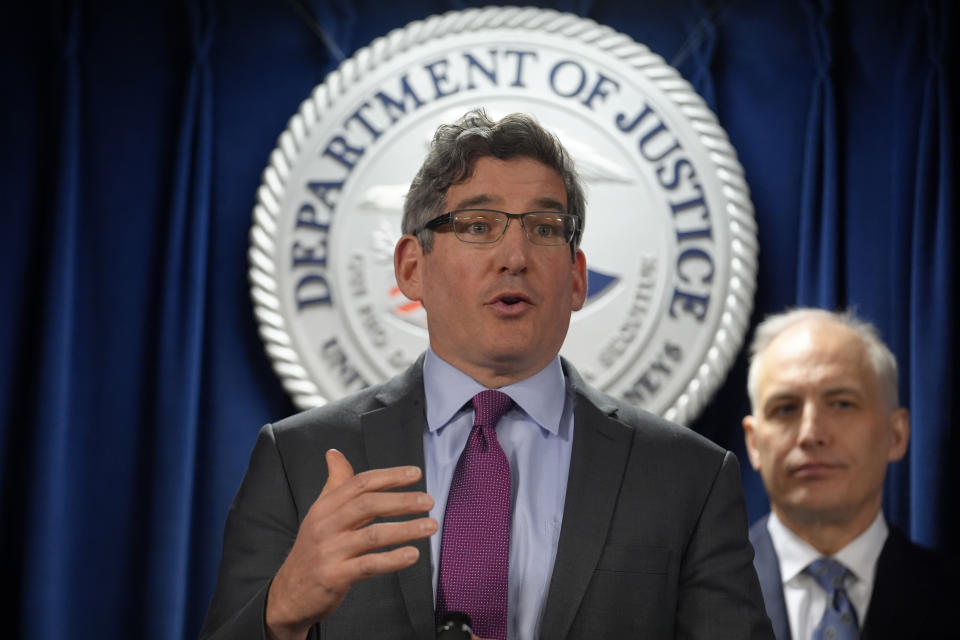 Acting U.S. Attorney District of Massachusetts Joshua Levy, left, faces reporters as Assistant Attorney General Justice Department's National Security Division Matthew Olsen, right, looks on during a news conference, Monday, March 4, 2024, in Boston. Massachusetts Air National Guardsman Jack Teixeira plead guilty in federal court Monday to leaking highly classified military documents about Russia's war in Ukraine and other national security secrets. (AP Photo/Steven Senne)