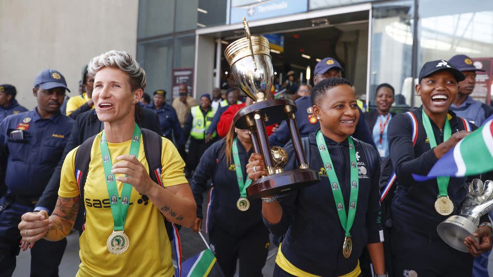 South African players celebrate winning the 2022 Women's Africa Cup of Nations. - Phill Magakoe/AFP/Getty Images