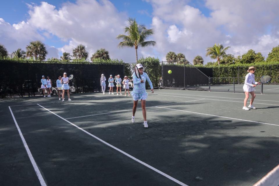 Ladies warm up for a tennis match between Phipps Ocean Park and the North Palm Beach Tennis Club. [DAMON HIGGINS/palmbeachdailynews.com]