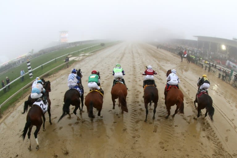 Justify (2R) broke cleanly from the seventh post and quickly moved to the front on a Pimlico track rated sloppy after days of rain in Baltimore