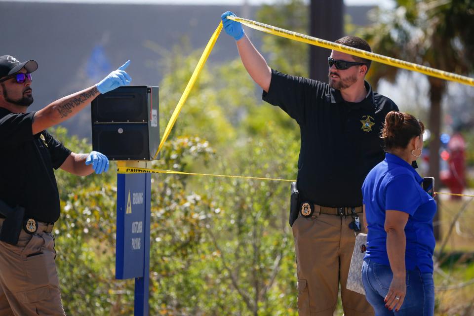 ee County Sheriff’s deputies hold the tape so shoppers and employees can leave the perimeter around the Restaurant Depot in south Fort Myers on Thursday, March 16, 2023. Lee County Sheriff's Office confirms they are completing a homicide investigation in which one person is dead.