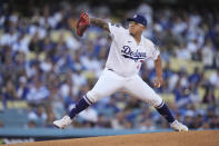 Los Angeles Dodgers pitcher Julio Urias winds up during the first inning against the Atlanta Braves in Game 4 of baseball's National League Championship Series Wednesday, Oct. 20, 2021, in Los Angeles. (AP Photo/Ashley Landis)