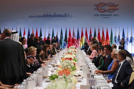 Delegates attend the official dinner at the Elbphilharmonie Concert Hall during the G20 summit in Hamburg, Germany July 7, 2017. REUTERS/Kay Nietfeld