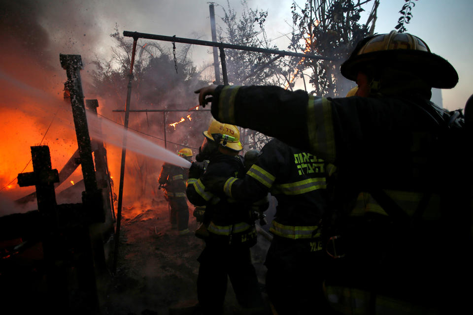 Massive wildfires tear across Israel