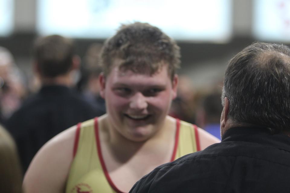 A smile beams from the face of Fort Benton's Brock Hanford after winning the Class B/C heavyweight championship during the Combined All-Class State Wrestling Tournament Saturday, Feb. 12, 2022 at MetraPark's First Interstate Bank Arena in Billings. Hanford defeated Cascade's Caden Crowell by pinfall.