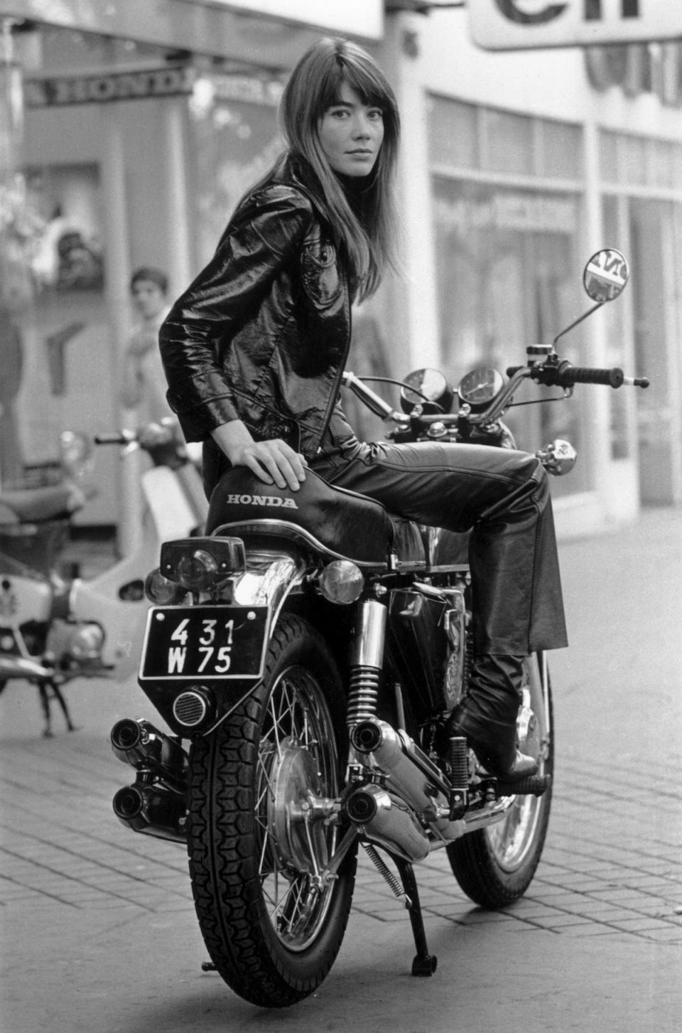 Francoise Hardy sitting on a Honda CB750 motorcycle, Paris, 25th October 1969 (Getty Images)