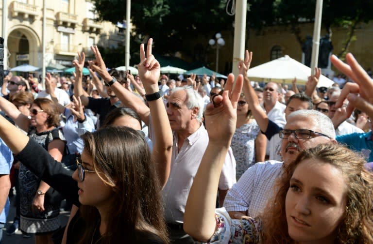 People in Malta have protested to demand justice after the killing of blogger Daphne Caruana Galizia