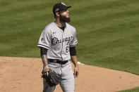 Chicago White Sox pitcher Dallas Keuchel walks to the dugout after retiring the Oakland Athletics during the first inning of Game 2 of an American League wild-card baseball series Wednesday, Sept. 30, 2020, in Oakland, Calif. (AP Photo/Eric Risberg)