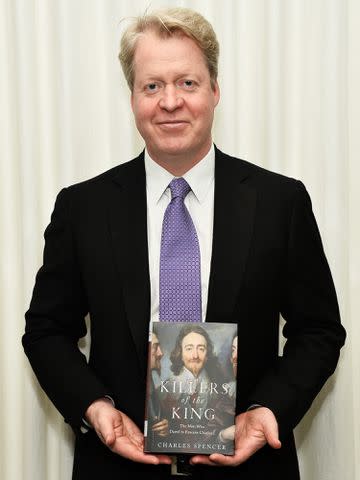 <p>Amanda Edwards/WireImage</p> Lord Charles Spencer poses with a copy of his book "Killers of the King : The Men Who Dared to Execute Charles I" at the British American Business Council Los Angeles Distinguished Speaker Series special book signing event on March 3, 2015 in Santa Monica, California.