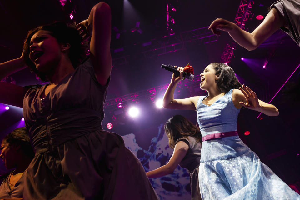 This image released by Boneau/Bryan-Brown shows Arielle Jacobs as Imelda Marcos, right, during a performance of "Here Lies Love," opening July 20 at the Broadway Theatre in New York. (Boneau/Bryan-Brown via AP)