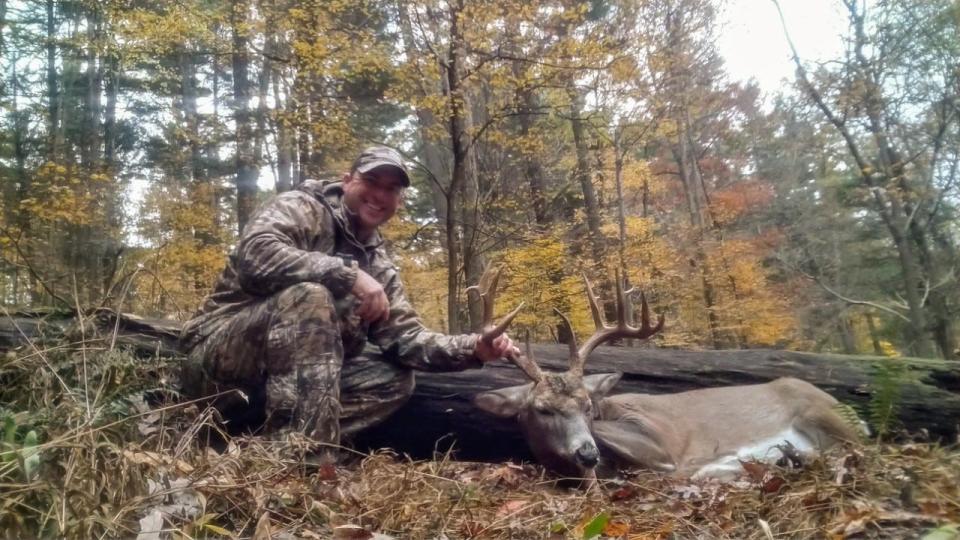 Frank "Keith" Malinowski shows the buck he hunted in October while his dad was in the hospital fighting COVID-19. Malinowski was able to have the nurses print this photo to hang in his father's room in intensive care to lift his spirits.