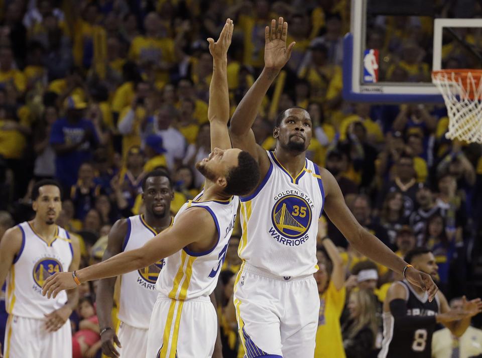 Durant has fit right in with Steph Curry and Co. (AP)