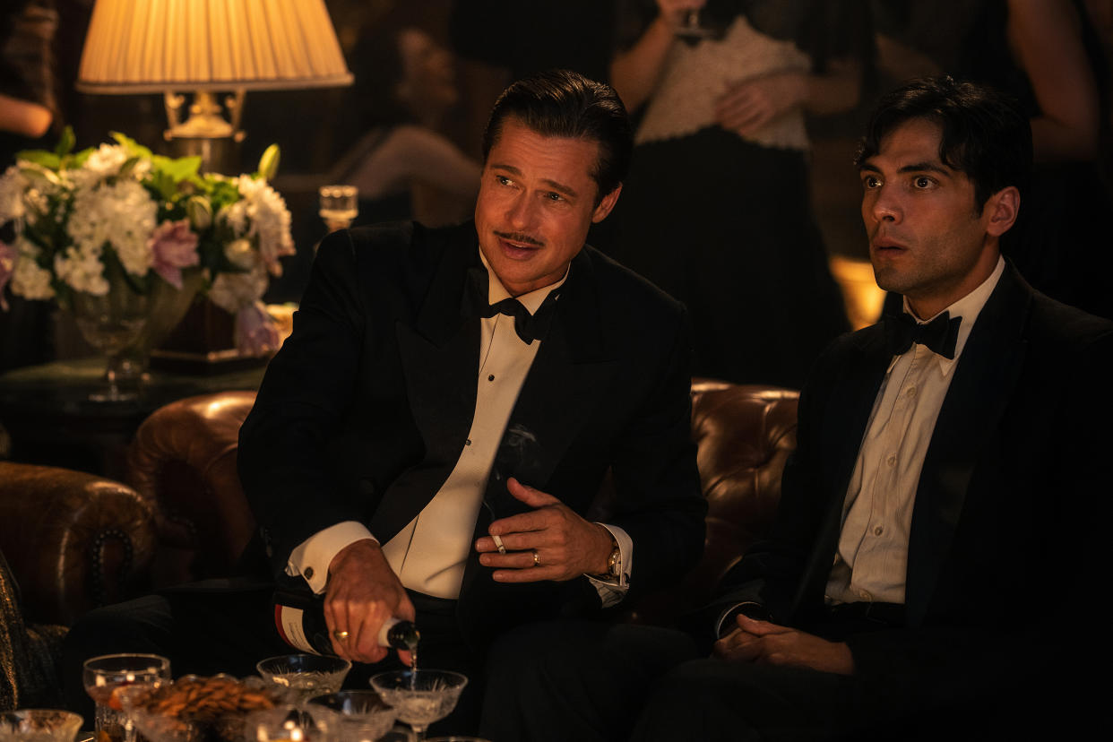 Diego Calva as Manny Torres with Brad Pitt as Jack Conrad in 