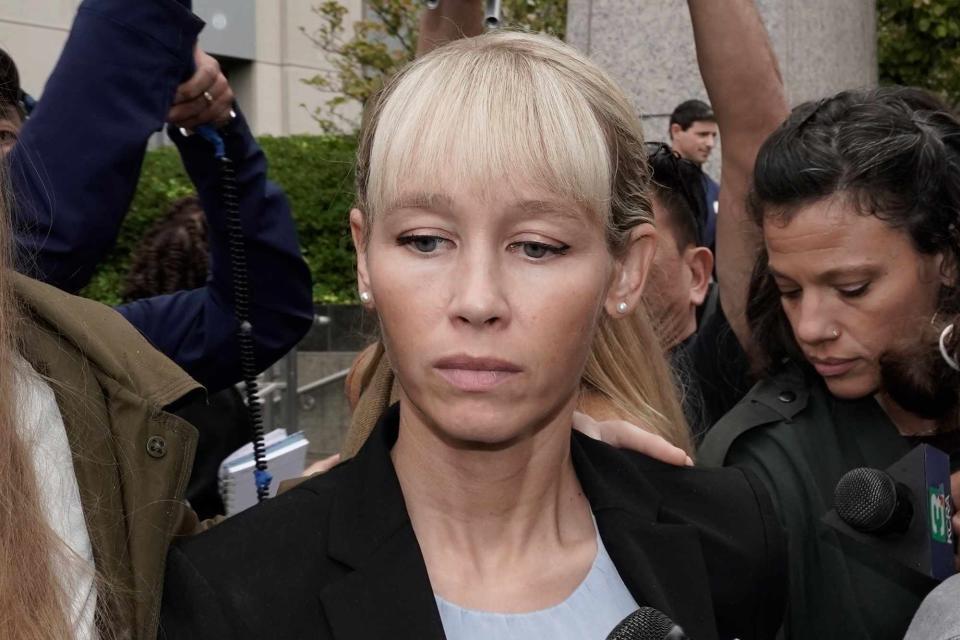 <p>Rich Pedroncelli/AP</p> Sherri Papini leaves the federal courthouse in Sacremento, CA on September 19, 2022.