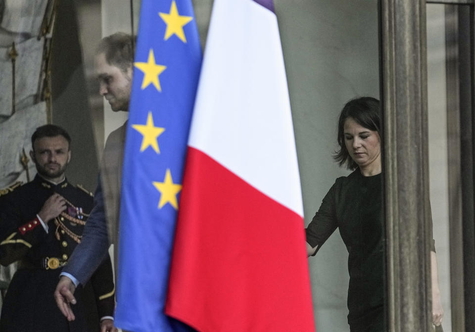 Germany's Foreign Minister Annalena Baerbock walks over a media conference after she took part at a French Cabinet meeting at the Elysee Palace in Paris, Wednesday, May 10, 2023. (AP Photo/Michel Euler)